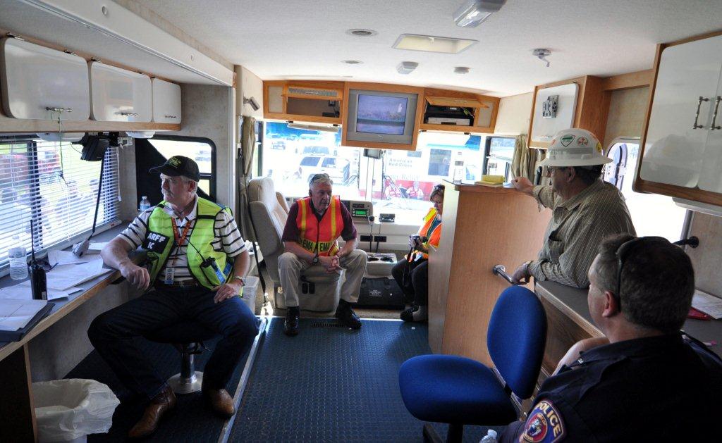Inside the moving command center, a large vehicle.